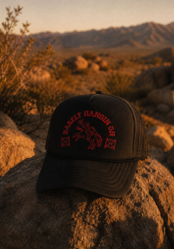 Barely Hangin' On Trucker Hat