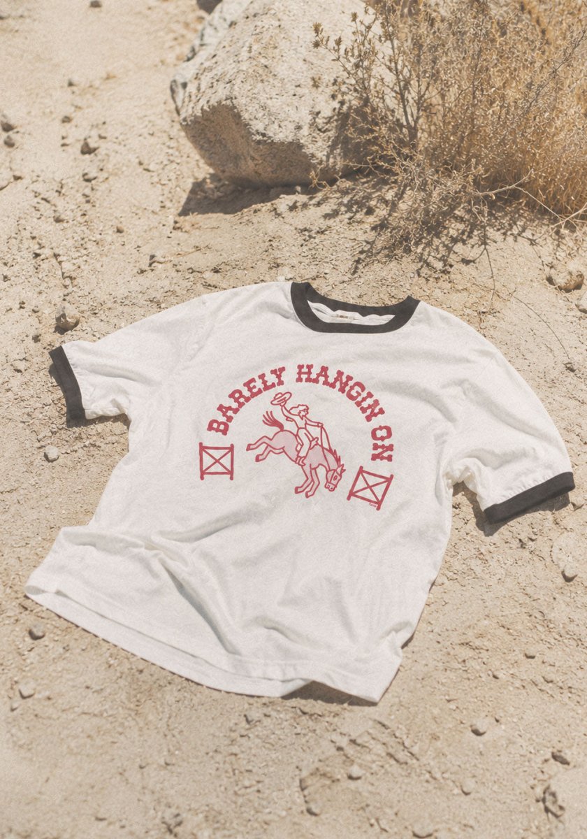 Barely Hangin' On Ringer Tee by kaeraz cowgirl desert horse