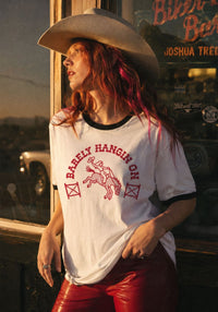 Barely Hangin' On Ringer Tee by kaeraz cowgirl desert horse