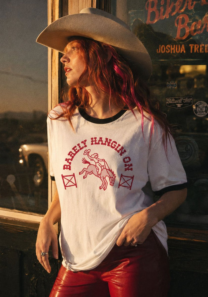 Barely Hangin' On Ringer Tee by kaeraz cowgirl desert horse